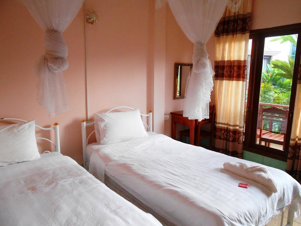 Jammee Guesthouse Vang Vieng Quarto foto